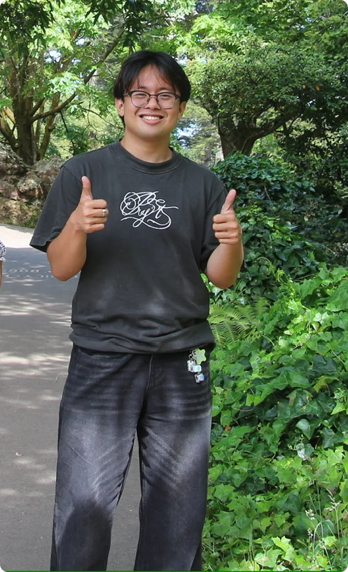 Nathan giving two thumbs up